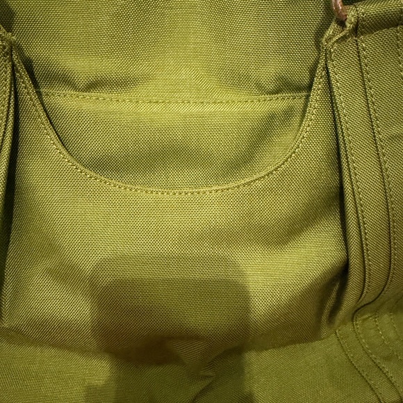 Danzo Diaper Bag in Green and tan with multiple compartments inside - Picture 3 of 11
